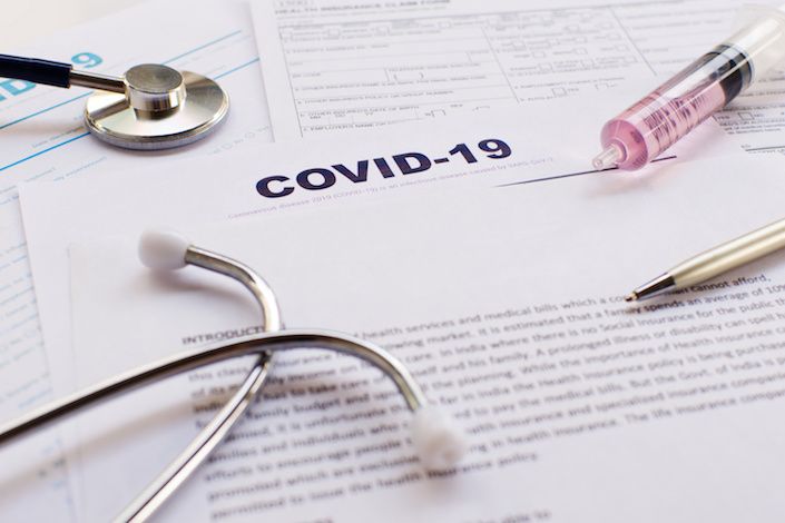 COVID-19 travel insurance: costs, coverage and the fine print