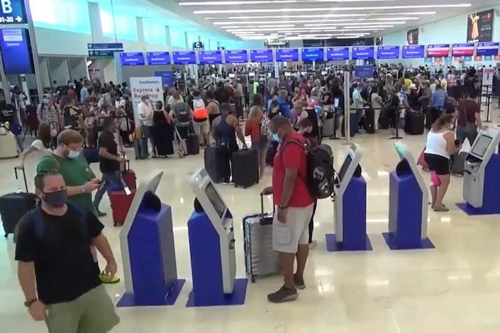 Federal authorities asked to step in after hours-long immigration lines at Cancun International Airport