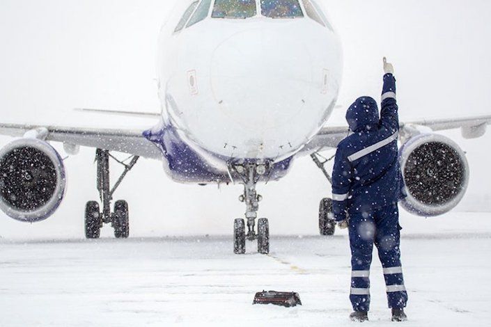 Snowstorm over southern B.C. halts flights at Vancouver airport