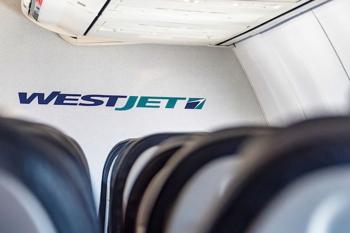 WestJet says system outage delaying some flights