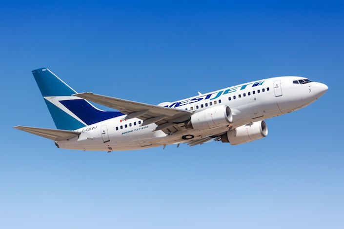 WestJet steps up calls to drop mask mandate for air travel, citing safety issues for flight crews
