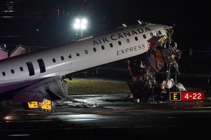 LaGuardia airport crash: Air Canada Express flight 8646 from Montreal kills 2 pilots, injures 41