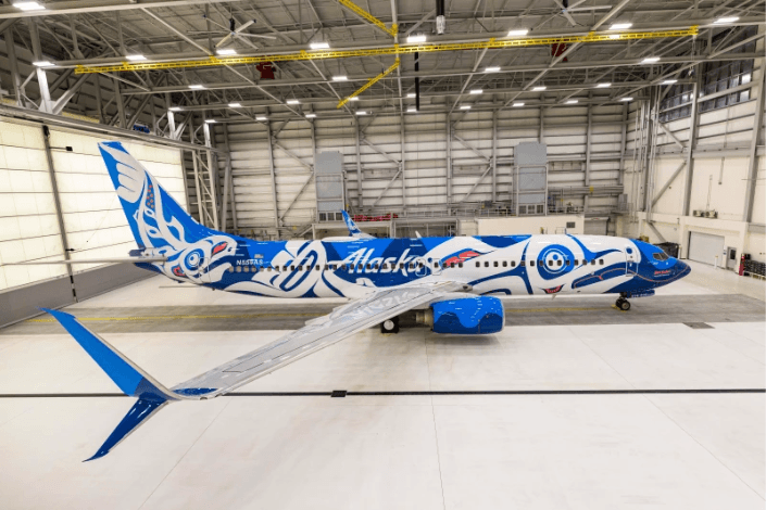 Alaska Airlines unveils salmon livery designed by Alaska Native artist to celebrate Indigenous culture & language