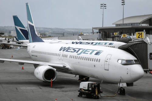 WestJet raises checked bag fees again