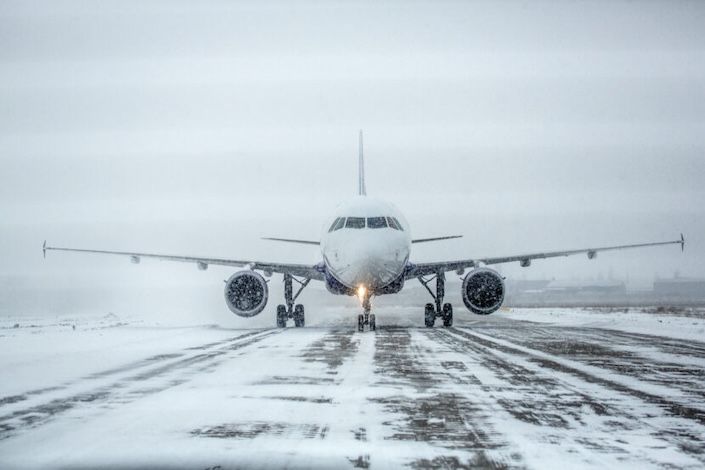 Snow storm impacting flights at Pearson and more; airlines post rebooking policies