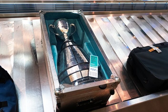 WestJet surprises fans with Grey Cup at Winnipeg airport